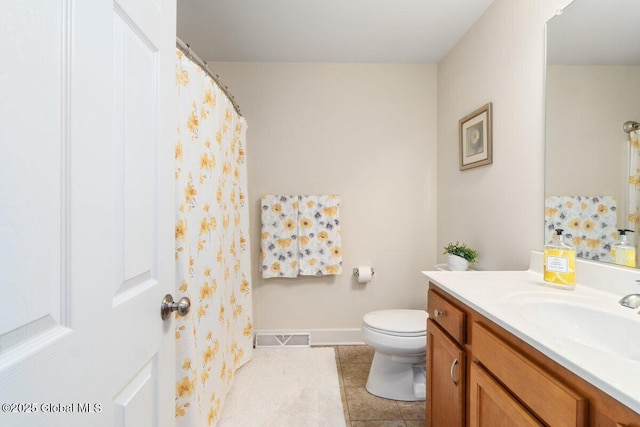 full bath with tile patterned flooring, toilet, vanity, visible vents, and baseboards