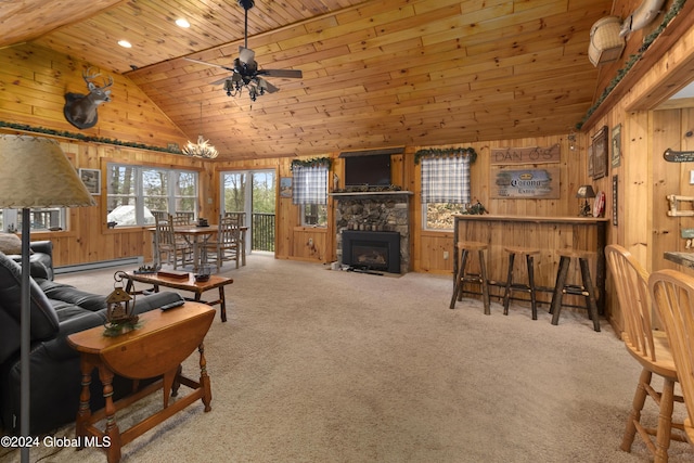 living room with wooden ceiling, a baseboard radiator, light carpet, and wooden walls