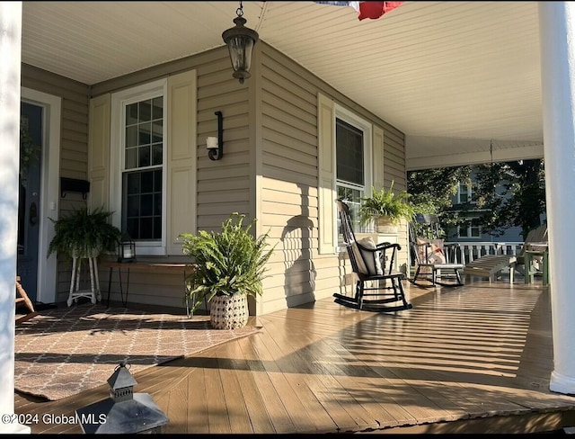 wooden deck featuring a porch