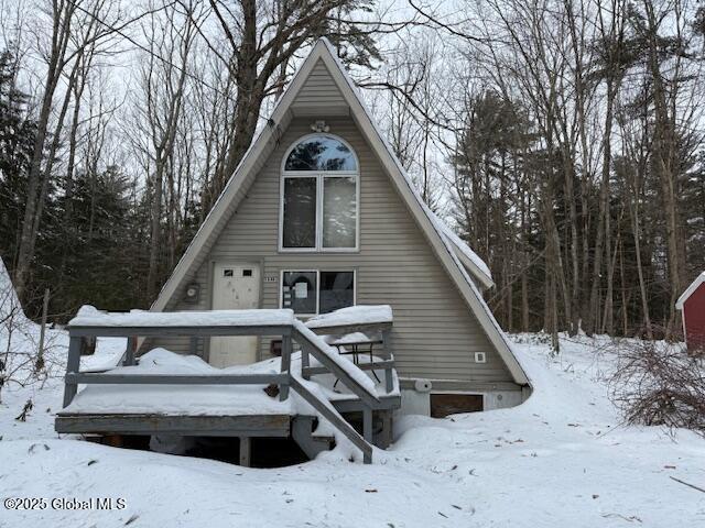 view of snow covered house