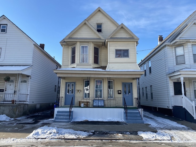 view of front property with covered porch