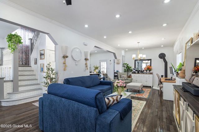 living area featuring recessed lighting, dark wood-style flooring, an inviting chandelier, and stairs