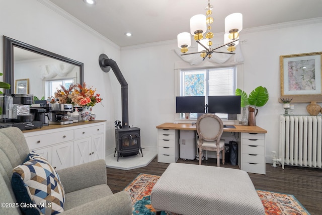 office space with dark wood-style flooring, radiator heating unit, and crown molding