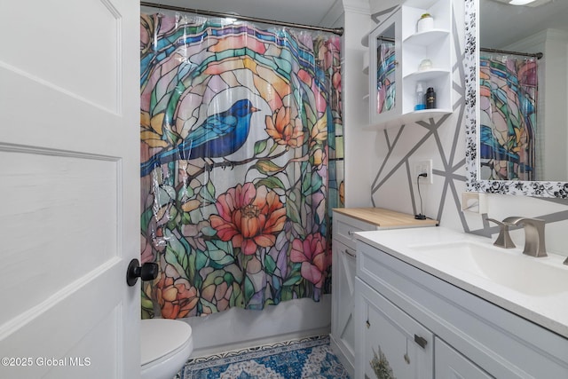 full bath with curtained shower, vanity, and toilet