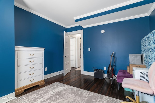 bedroom featuring dark wood-style floors, ornamental molding, and baseboards