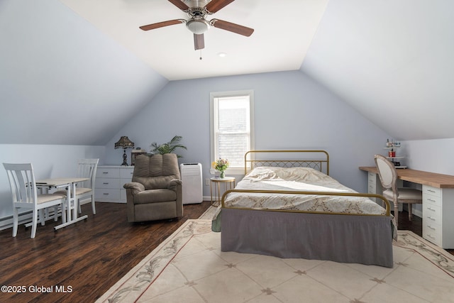 bedroom featuring vaulted ceiling, ceiling fan, and wood finished floors