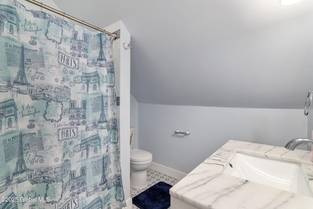 bathroom featuring lofted ceiling, toilet, a shower with shower curtain, vanity, and baseboards