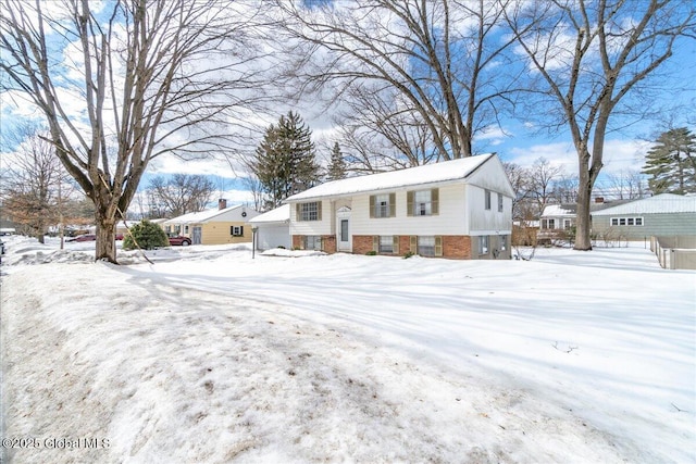 bi-level home with brick siding