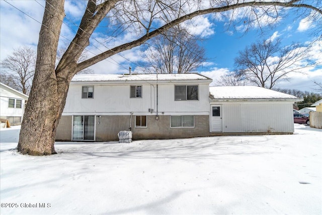 view of snow covered property