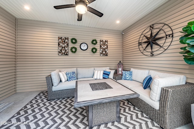 exterior space featuring a ceiling fan and an outdoor hangout area