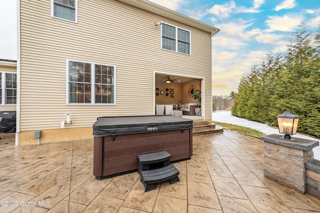 view of patio / terrace with a hot tub