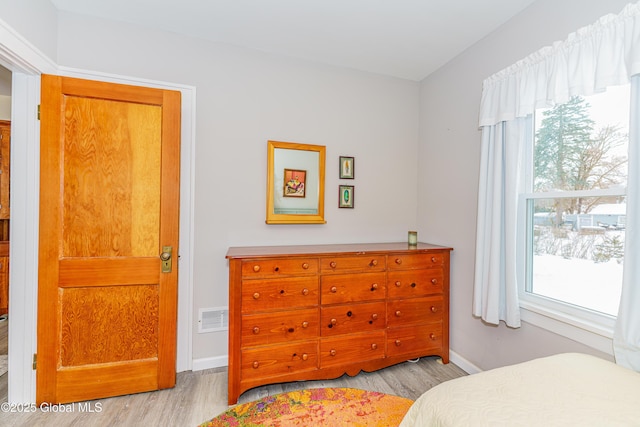 bedroom featuring light hardwood / wood-style floors