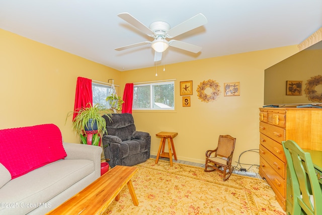 living room featuring ceiling fan