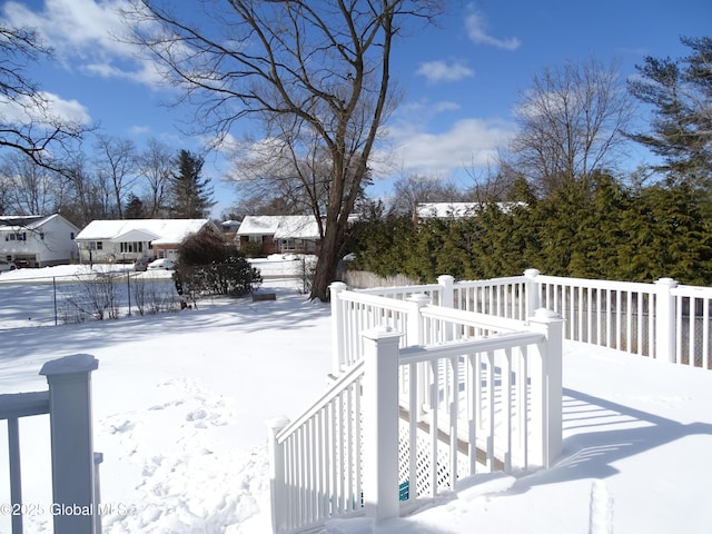 view of yard covered in snow