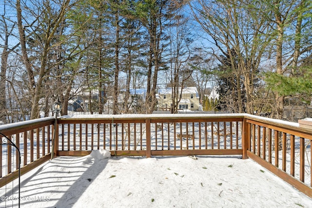 view of snow covered deck