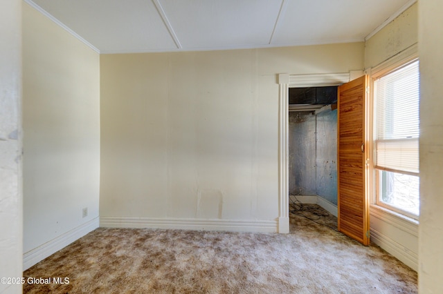 unfurnished bedroom with a closet and carpet flooring