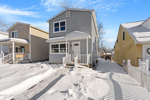 view of front of home with fence