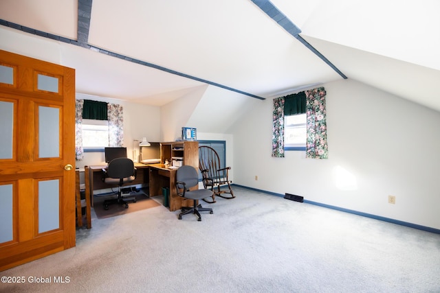 office featuring baseboards, carpet flooring, and lofted ceiling