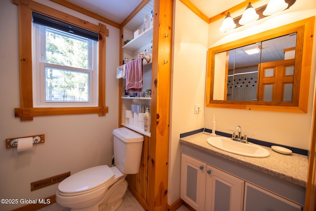 bathroom with visible vents, a shower with shower curtain, toilet, and vanity