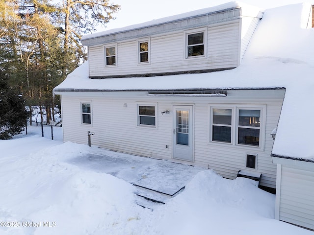 view of snow covered property