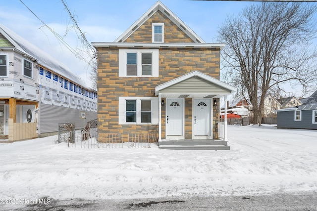 view of front of property featuring stone siding