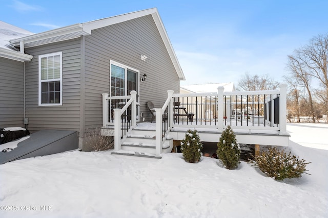 view of snow covered house