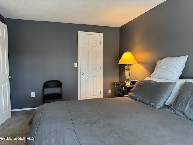 bedroom featuring carpet