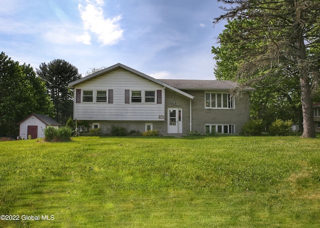 raised ranch featuring a front yard