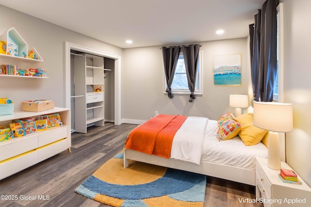 bedroom with recessed lighting, a closet, baseboards, and dark wood-style flooring