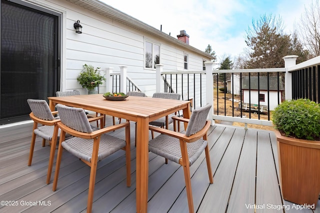 deck featuring outdoor dining space