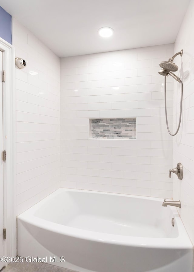 bathroom featuring shower / washtub combination