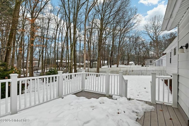 view of snow covered deck