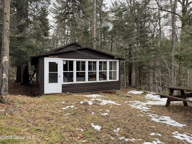 exterior space with a sunroom