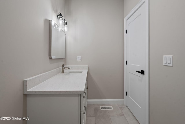 706 Swaggertown Rd, Charlton, NY 12302 - bathroom with vanity, tile patterned flooring, and baseboards