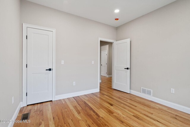 706 Swaggertown Rd, Charlton, NY 12302 - unfurnished bedroom featuring light wood-style flooring, baseboards, and recessed lighting