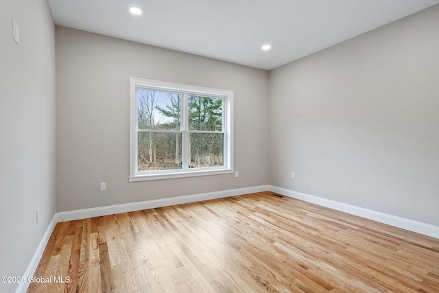 706 Swaggertown Rd, Charlton, NY 12302 - empty room featuring light wood finished floors, baseboards, and recessed lighting