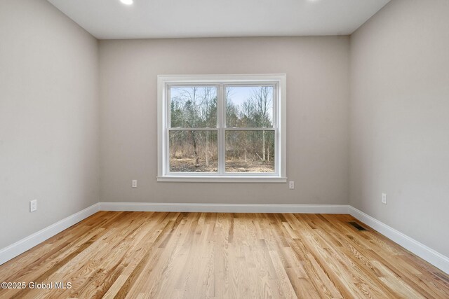 706 Swaggertown Rd, Charlton, NY 12302 - empty room with baseboards and light wood finished floors