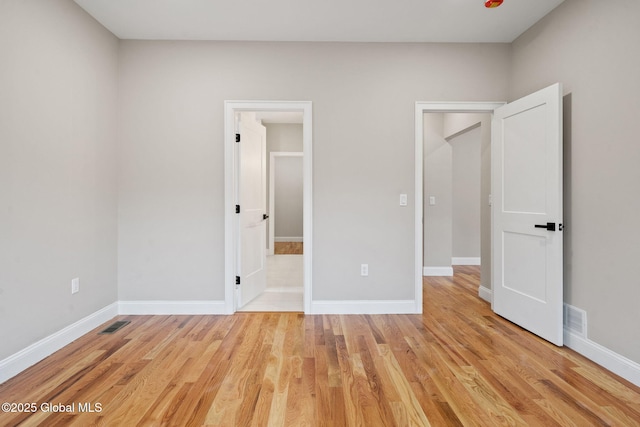 706 Swaggertown Rd, Charlton, NY 12302 - unfurnished bedroom featuring light wood-style flooring and baseboards