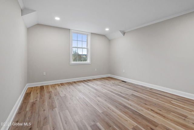 706 Swaggertown Rd, Charlton, NY 12302 - empty room featuring light wood-style flooring, lofted ceiling, baseboards, and recessed lighting