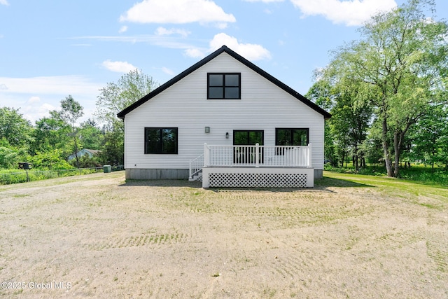 706 Swaggertown Rd, Charlton, NY 12302 - rear view of house with a wooden deck