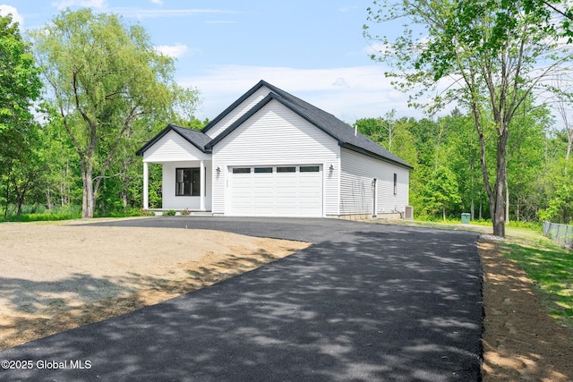 706 Swaggertown Rd, Charlton, NY 12302 - ranch-style home with driveway and an attached garage