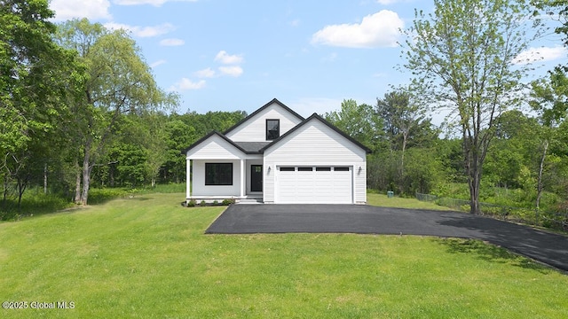 706 Swaggertown Rd, Charlton, NY 12302 - view of front of house featuring asphalt driveway, a front yard, and a garage