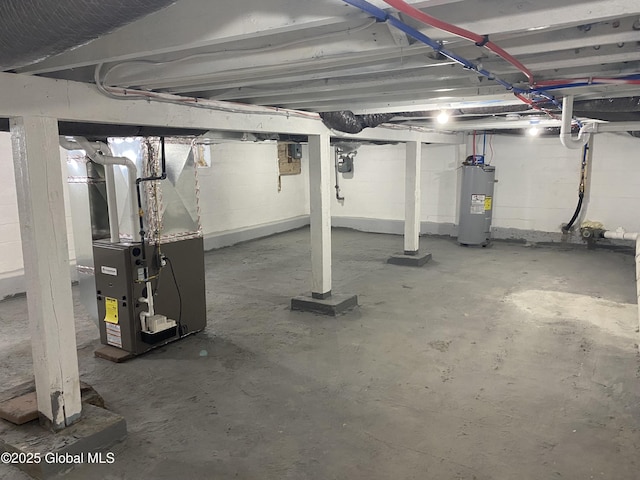 unfinished basement featuring water heater and heating unit