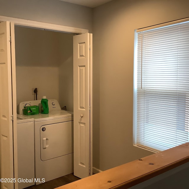 laundry room featuring laundry area and separate washer and dryer