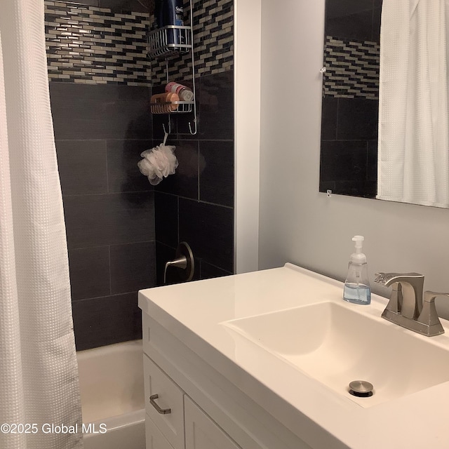 full bath featuring shower / tub combo with curtain and vanity