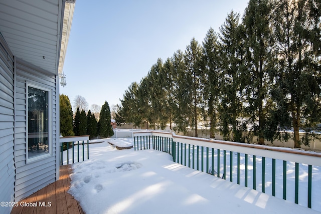 view of snow covered deck