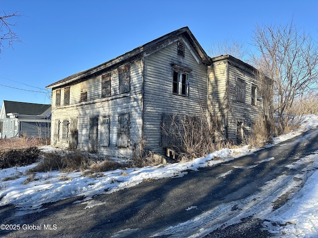 view of snow covered property