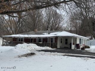 view of snow covered property