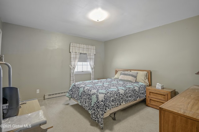 bedroom with light carpet and baseboard heating