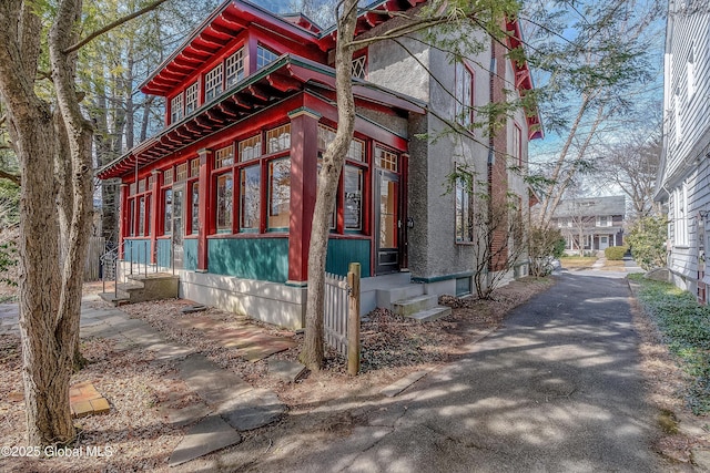 view of home's exterior with entry steps